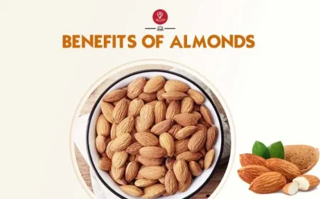 A close-up image of raw almonds in a bowl, symbolizing their health benefits for brain function and hair growth.