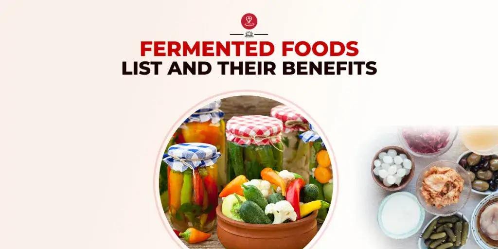 Assortment of fermented foods including yogurt, kimchi, kefir, kombucha, and tempeh