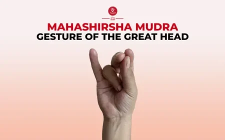 Woman practicing Mahashirsha Mudra during meditation.