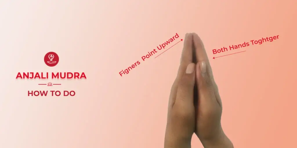 Woman practicing Anjali Mudra during meditation.
