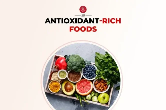 Assortment of antioxidant-rich foods like berries and nuts on a wooden table