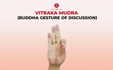 Person practicing Vitarka Mudra (Gesture of Teaching) in a seated meditation pose with thumb and index finger touching, symbolizing wisdom, mindfulness, concentration, and inner peace.