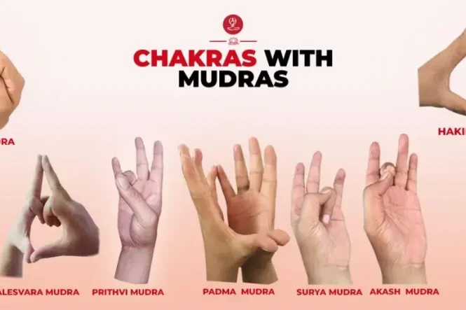 Person practicing yoga mudras for balancing all seven chakras during meditation