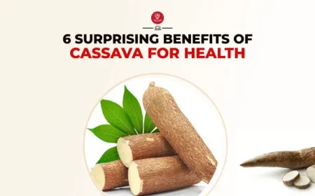 Fresh cassava roots stacked on a market shelf
