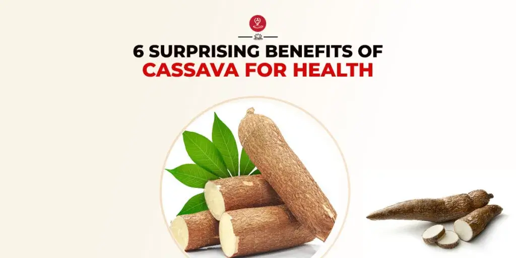 Fresh cassava roots stacked on a market shelf
